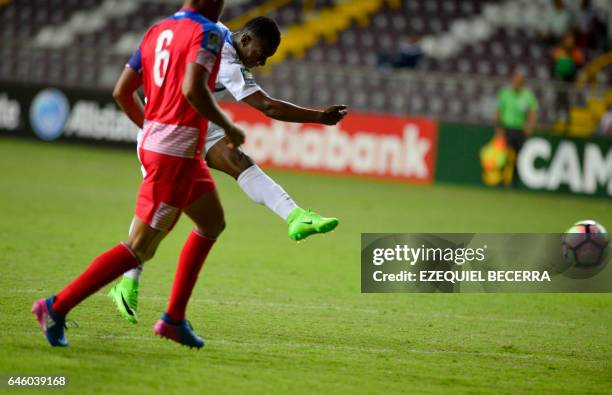 Honduran footballer Darixon Vuelto shoots a goal, next to Panama's Javier Rivera , during their Under 20 Concacaf qualifying football match at the...