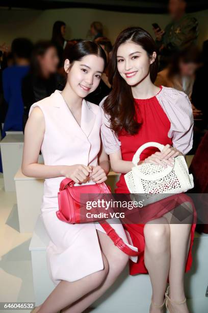 Cellist Nana Ou-yang and Model Sui He attend Ferragamo show during Milan Fashion Week Fall/Winter 2017/18 on February 26, 2017 in Milan, Italy.