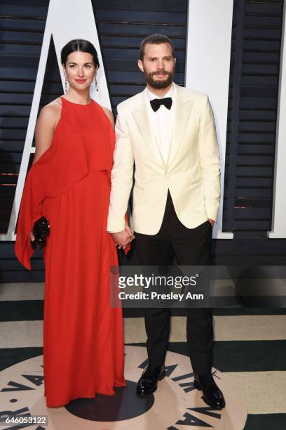 Amelia Warner and Jamie Dornan attend the 2017 Vanity Fair Oscar Party hosted by Graydon Carter at Wallis Annenberg Center for the Performing Arts on...