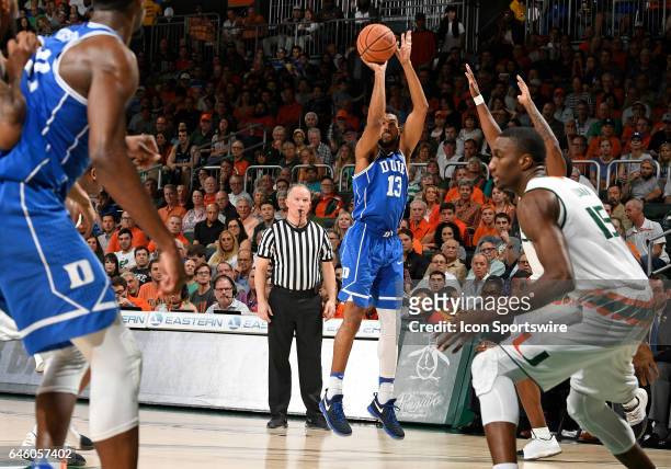 Duke guard Matt Jones shoots during a college basketball game between the Duke University Blue Devils and the University of Miami Hurricanes on...
