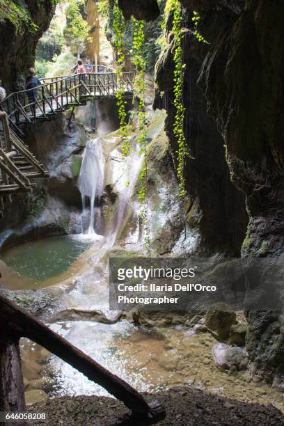 fregona (treviso, italy), aprile 2016: waterfalls on the footpath in caglieron cave. - fregona stock pictures, royalty-free photos & images