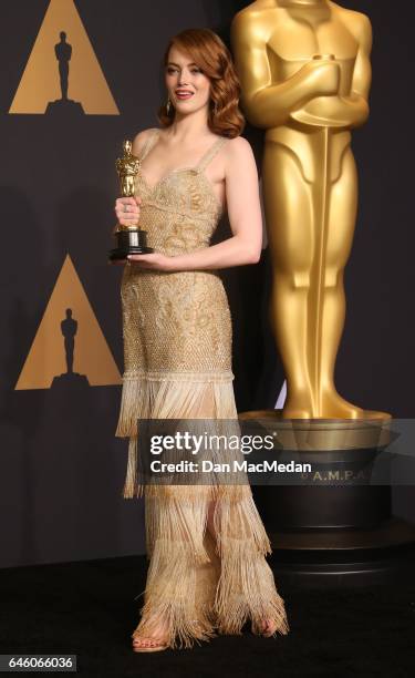 Actress Emma Stone, winner of Best Actress for 'La La Land,' poses in the press room at the 89th Annual Academy Awards at Hollywood & Highland Center...