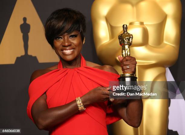 Actress Viola Davis poses in the press room with the Oscar for Best Actress in a Supporting Role for 'Fences' at the 89th Annual Academy Awards at...