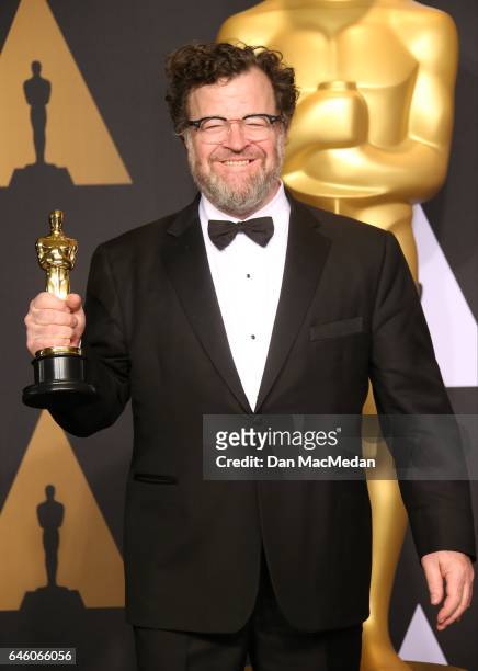 Writer/director Kenneth Lonergan, winner of the Best Original Screenplay award for 'Manchester by the Sea' poses in the press room at the 89th Annual...