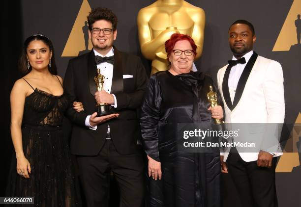 Actor Salma Hayek, director Kristof Deak and producer Anna Udvardy, winners of Best Live Action Short Film for 'Sing' and actor David Oyelow pose in...