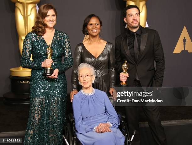 Mathematician Katherine Johnson and director Ezra Edelman and producer Caroline Waterlow , winners of Best Documentary Feature for 'O.J.: Made in...