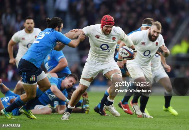 Luke McLean of Italy attempts to tackle James Haskell of England during the RBS Six Nations match between England and Italy at Twickenham Stadium on...