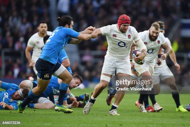 Luke McLean of Italy attempts to tackle James Haskell of England during the RBS Six Nations match between England and Italy at Twickenham Stadium on...