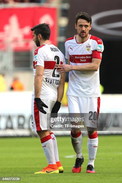 Emiliano Adrian Insua Zapata of Stuttgart shakes hands with Christian Gentner of Stuttgart during the Second Bundesliga match between VfB Stuttgart...