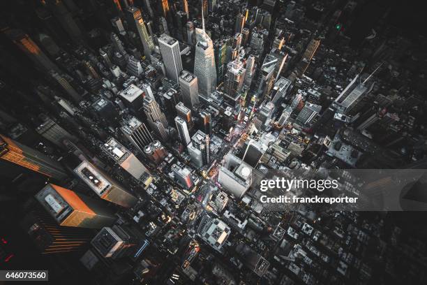 aerial view of times square at night - aerial view of mid town manhattan new york stock pictures, royalty-free photos & images