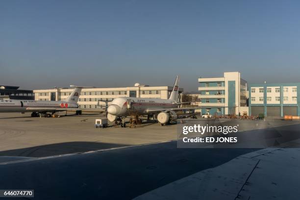 This photo taken on February 14, 2017 shows a Tupolev Tu-204 aircraft undergoing maintenance at Sunan Pyongyang International Airport. / AFP / Ed...