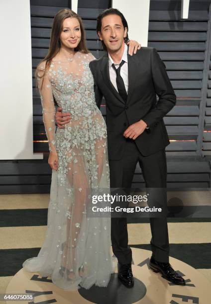 Actor Adrien Brody and Lara Lieto arrive at the 2017 Vanity Fair Oscar Party Hosted By Graydon Carter at Wallis Annenberg Center for the Performing...