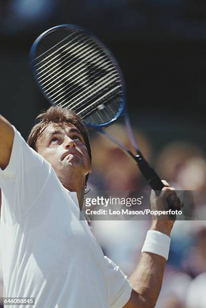 French tennis player Henri Leconte pictured in action competing to reach the fourth round in the Men's Singles tournament at the Wimbledon Lawn...