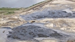 Tar And Oil Cover The Athabasca Oil Sands Along A Coastal Area Near ...
