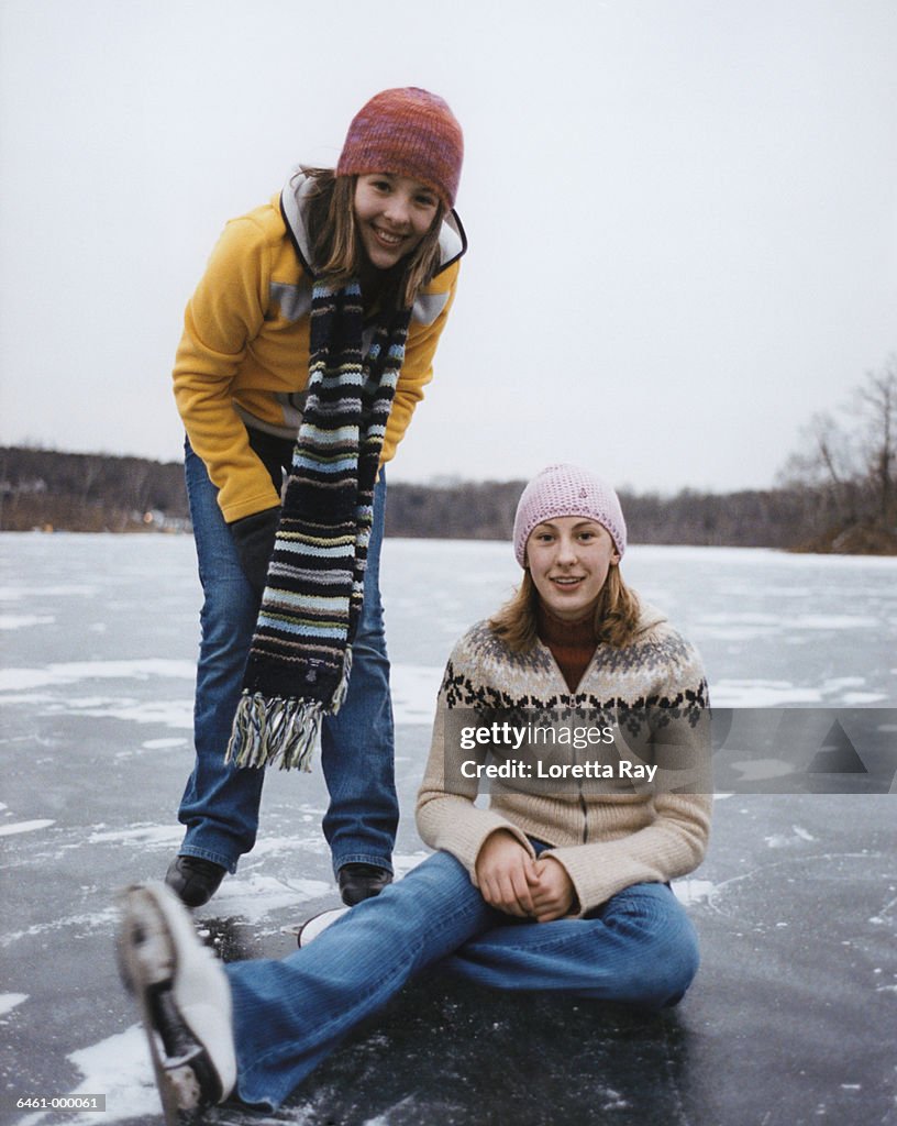Smiling Girls on Frozen Lake