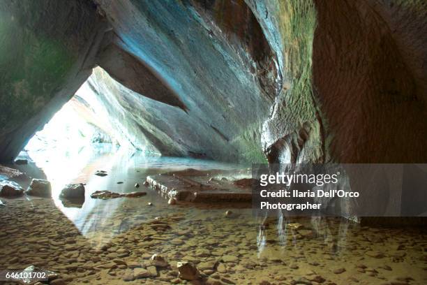 fregona (treviso, italy), aprile 2016: body of water in caglieron cave. - fregona stock pictures, royalty-free photos & images