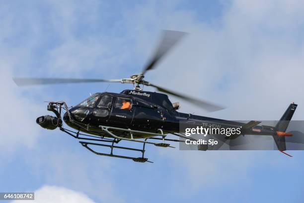 helicopter fitted with a camera installation in mid air - planes   2013 film stock pictures, royalty-free photos & images