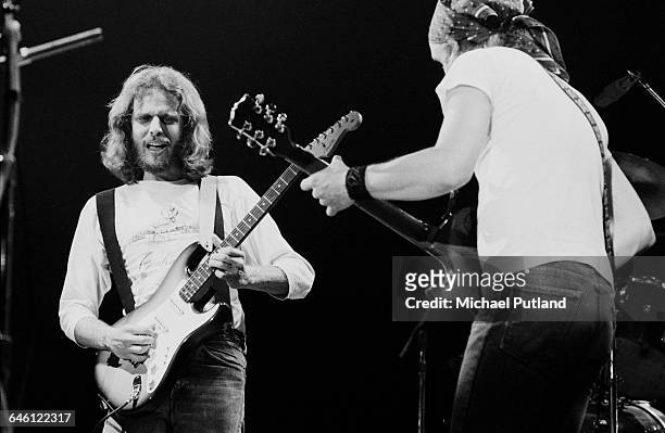 Guitarists Don Felder and Joe Walsh performing with American rock group, The Eagles, at Wembley Empire Pool , London, during their Hotel California...