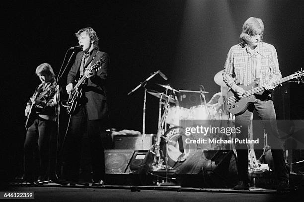 British rock and roll group, Rockpile, performing in New York, August 1979. Left to right: Billy Bremner, Dave Edmunds and Nick Lowe.