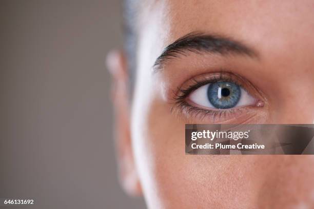 health and beauty - blue eyes stock pictures, royalty-free photos & images