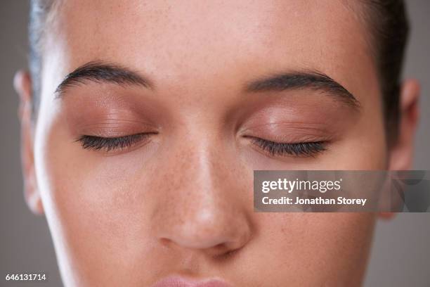 health and beauty - extreme close up face stock pictures, royalty-free photos & images