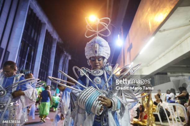 Revelers wait to perform outside the Sambodrome during Carnival festivities on February 27, 2017 in Rio de Janeiro, Brazil. Up to 70 cities and towns...