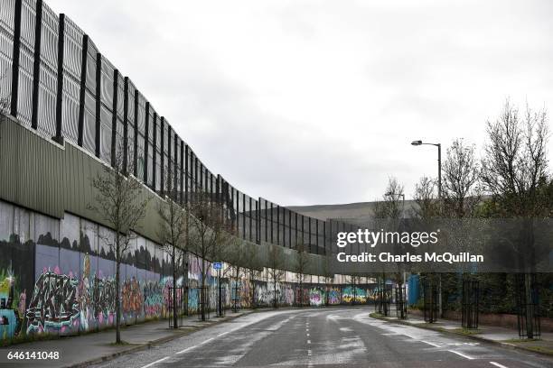 The peace wall which divides Catholic and Protestant communities pictured on February 22, 2017 in Belfast, Northern Ireland. Originally built in 1969...
