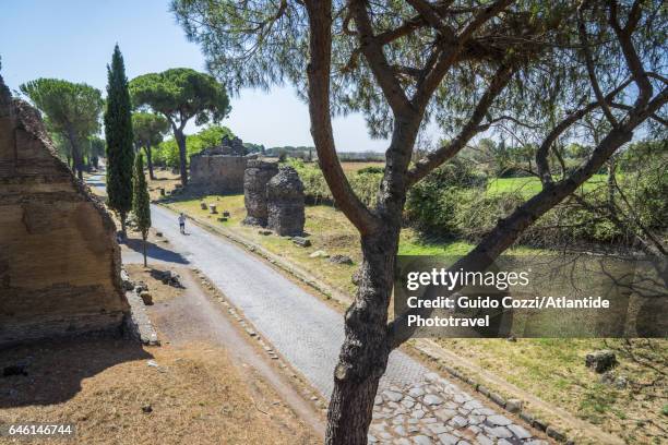 view of via appia (appian way), ancient roman road to southern italy - appian way stock pictures, royalty-free photos & images