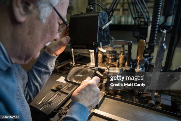 Printer Stan Lane checks the lettering produced by a composition caster at Gloucester Typesetting Services in Stonehouse, on February 27, 2017 in...