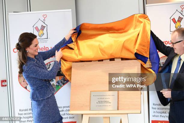 Catherine, Duchess of Cambridge unveils a plaque to commemorate her visit to the Ronald McDonald House Evelina in Lambeth to open the 'home away from...