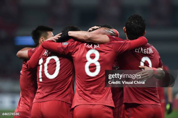 Oscar of Shanghai SIPG celebrates with team mates after scoring his team's second goal during the AFC Champions League 2017 Group F match between...