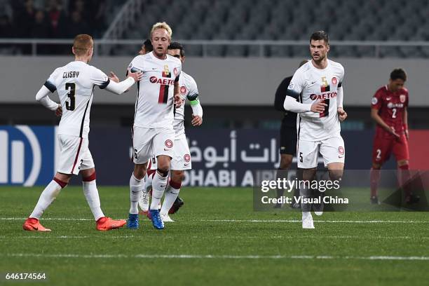 Mitch Nichols of Western Sydney Wanderers celebrates with team mates after scoring his team's first goal during the AFC Champions League 2017 Group F...