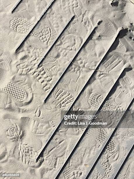 interesting textures - footsteps on a boardwalk bildbanksfoton och bilder