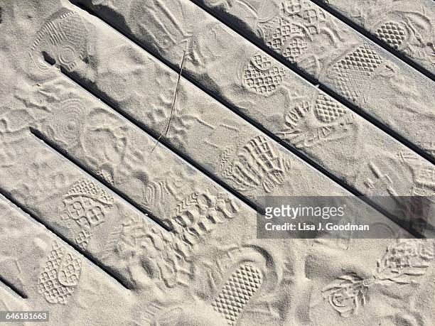 interesting textures - footsteps on a boardwalk bildbanksfoton och bilder