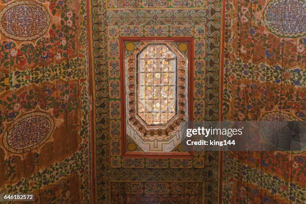 Colorful oriental Ceiling fragment inside the Bahia palace
