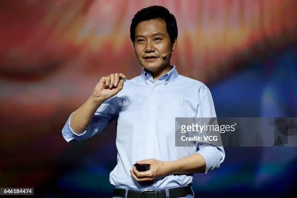 Xiaomi CEO Lei Jun introduces Surge S1 chipset, Mi 5C smartphone and Redmi 4X smartphone during a press conference on February 28, 2017 in Beijing,...