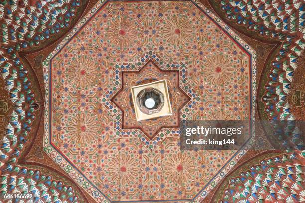 Colorful oriental Ceiling fragment inside the Bahia palace