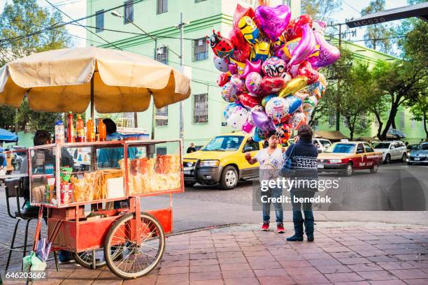 vendors in the coyoacan neighborhood of mexico city - mexico city street vendors stock pictures, royalty-free photos & images