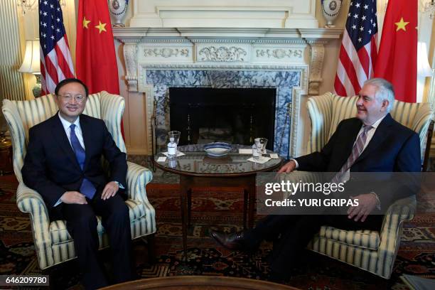 Secretary of State Rex Tillerson meets with Chinese State Councilor Yang Jiechi at the State Department in Washington,DC on February 28, 2017. / AFP...