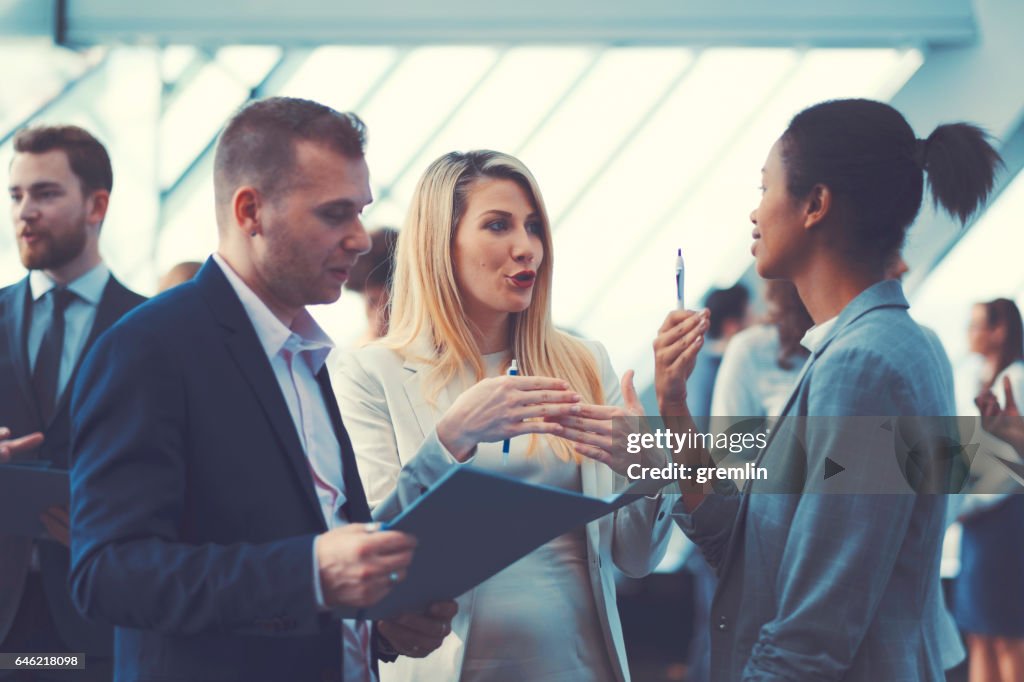 Business people at conference, coffee break