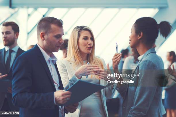 business people at conference, coffee break - government relations stock pictures, royalty-free photos & images