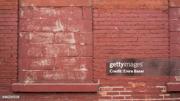 red brick wall with blocked window - red brick wall interior stock pictures, royalty-free photos & images