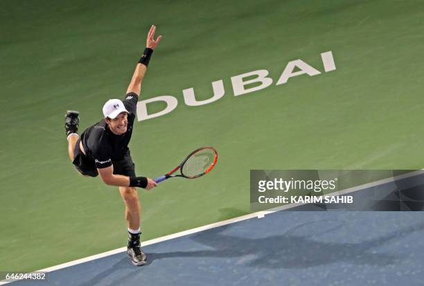 Britain's Andy Murray returns the ball to Malek Jaziri of Tunisia during their ATP Dubai Duty Free Tennis Championship on February 28, 2017 in Dubai....
