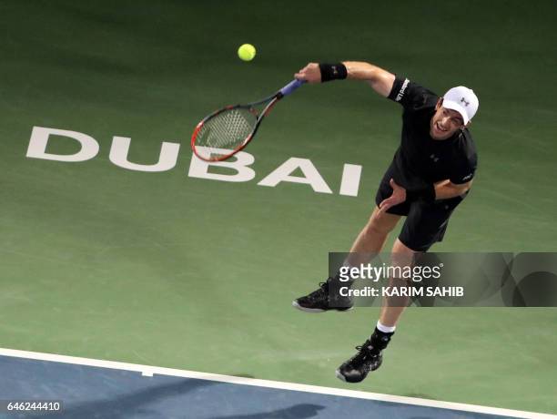 Britain's Andy Murray returns the ball to Malek Jaziri of Tunisia during their ATP Dubai Duty Free Tennis Championship on February 28, 2017 in Dubai....