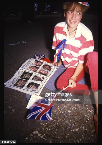 Fan of the Royal Family in London for the wedding of Andrew and Sarah, the Duke and Duchess of York.