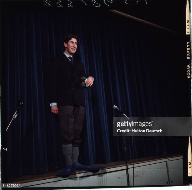 Prince Charles on stage at the Trinity Theatre taking part in a comedy sketch during his time as an undergraduate at Cambridge. | Location:...