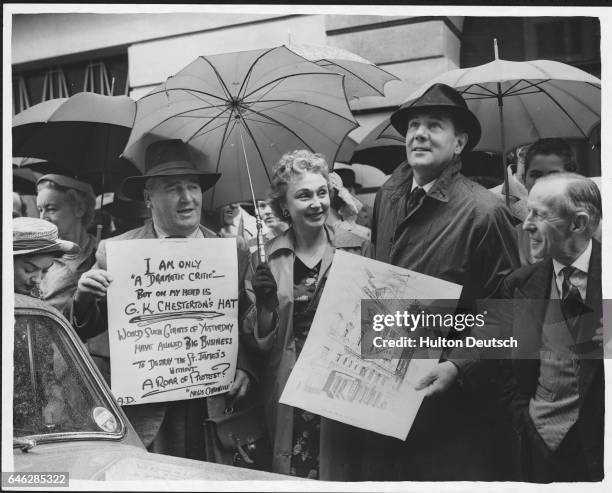 Actress Googie Withers and actor Michael Redgrave protesting against the closure of St James's Theatre, London, 1957.