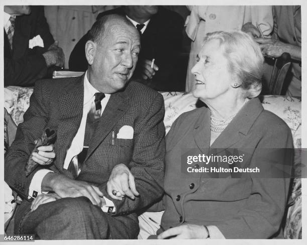 English actress Dame Sybil Thorndike chatting to English actor, playwright and composer Noel Coward, London, 1960. Dame Sybil is to appear in Mr...