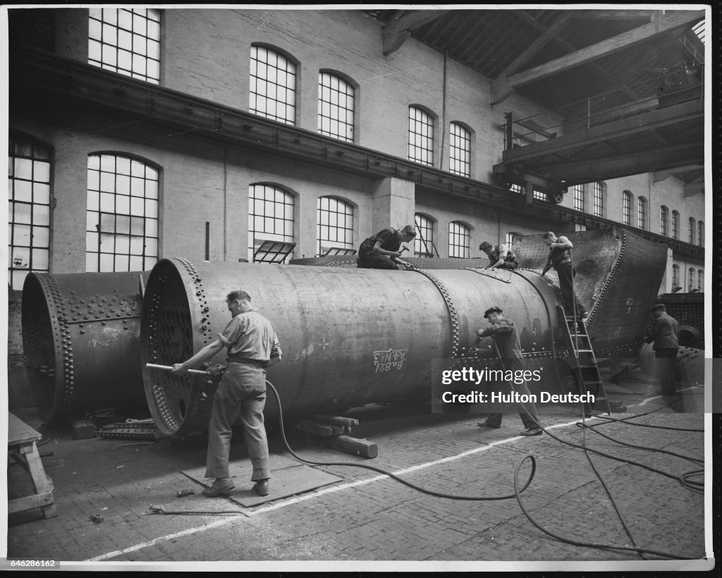 Barrel Train Engine Giants of the railroad in the making. The early stages of... News Photo ...