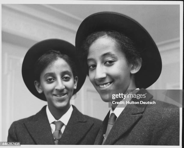 Princess Mary and Princess Siheen, the granddaughters of Haile Selassie I of Ethiopia, about to leave their London hotel for Beneden school.